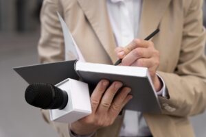 female-journalist-taking-notes