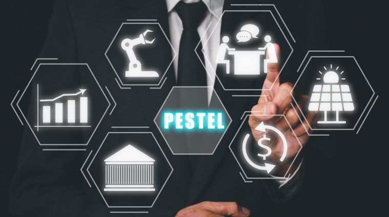 PESTEL analysis concept, political, economic, socio-cultural, technological, environmental and legal, Person hand touching PESTEL icon on virtual screen.